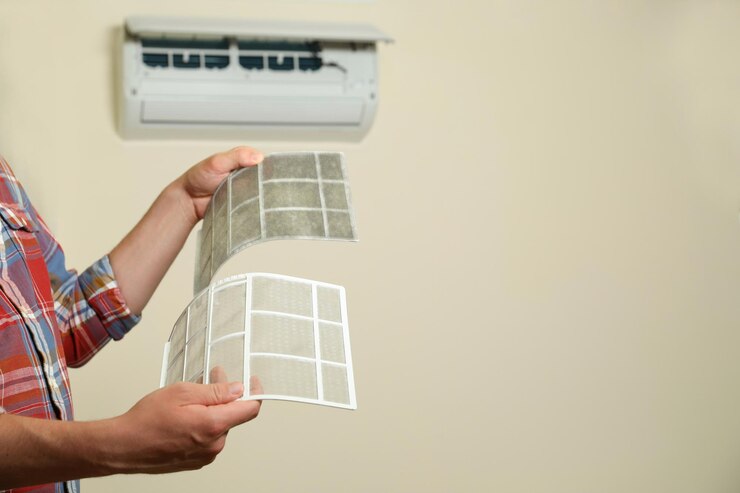 man-holding-dirty-clean-filters-space-text-home-air-conditioner-cleaning_495423-51443-1