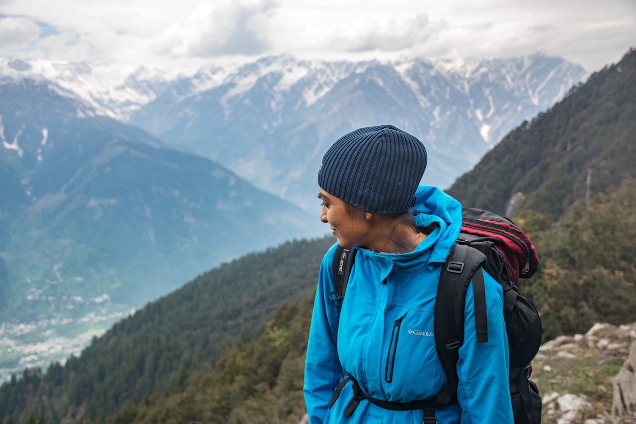 A hiker overlooking a mountain valley