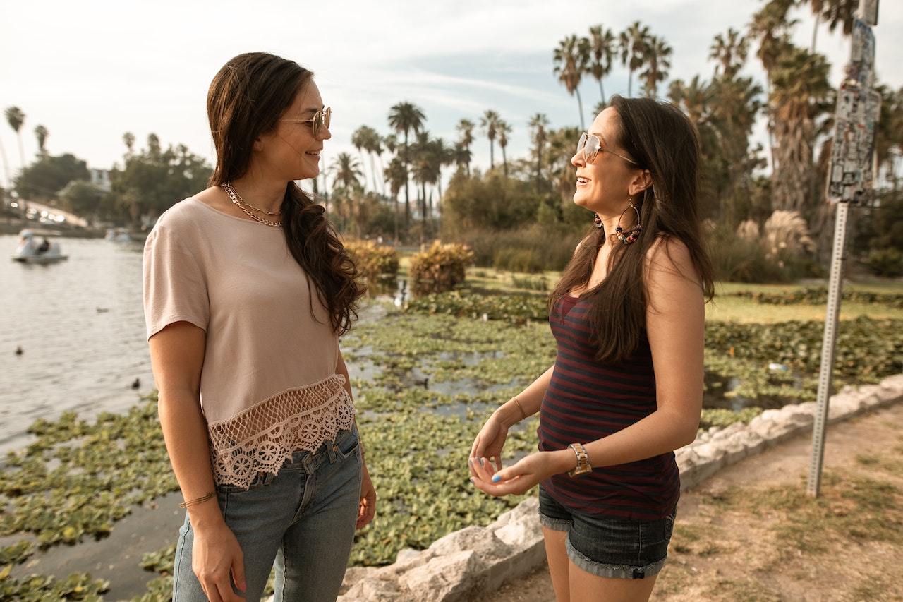Two women talking outdoors