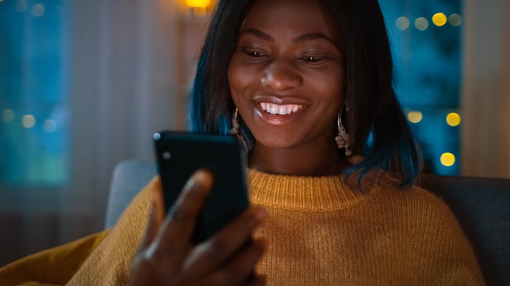 Person watching a video on their phone