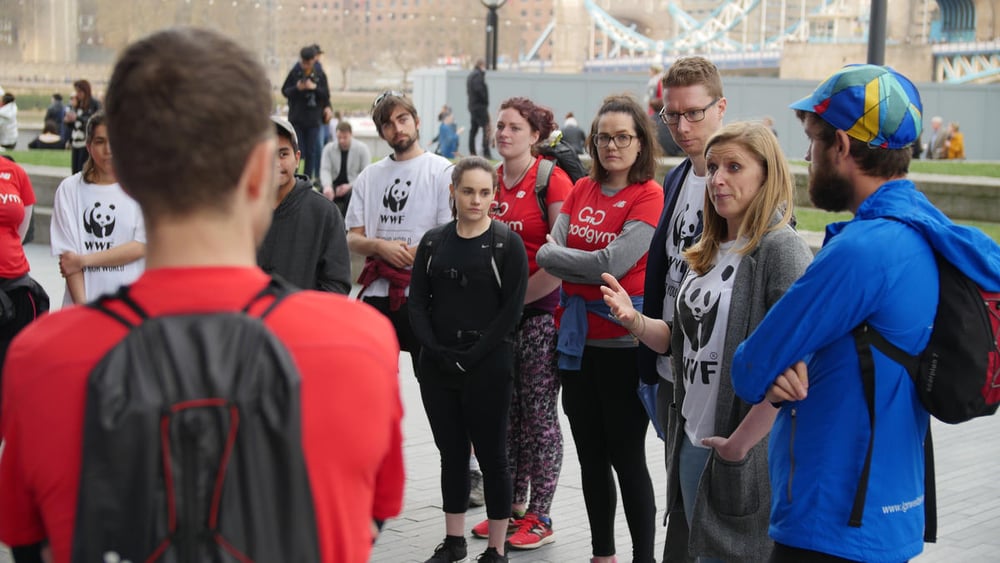 Rachel Bloodworth Director of Strategic Communications WWF talks to the runners in one of GoodGym’s Earth Hour events near City Hall, London before they set off across Tower Bridge, London.