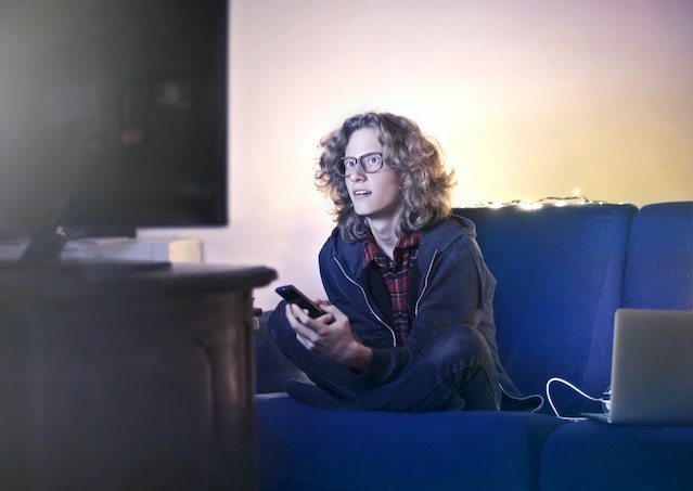 A man watching TV