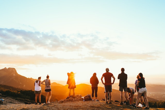 Friends watching the sunset together